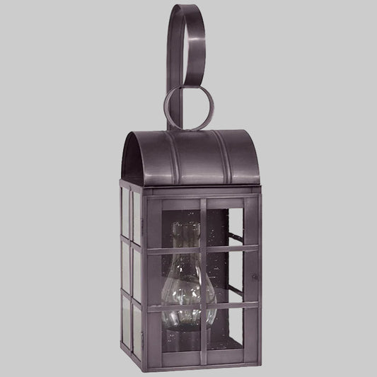 Decorative wall lantern with glass panels on a gray background