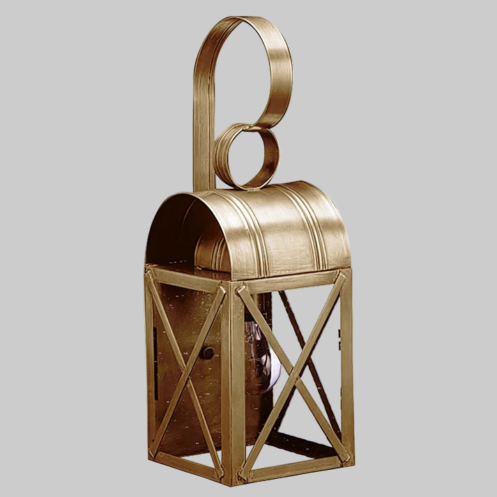 Gold metal lantern with circular top design on a gray background