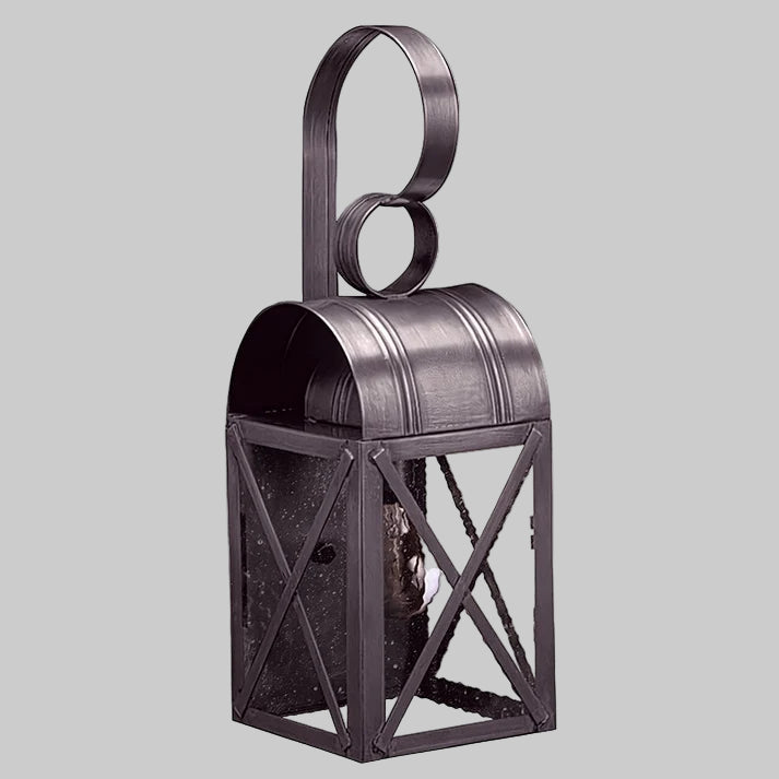 Decorative metal lantern with a handle on a gray background