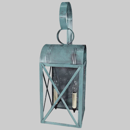 Decorative wall lantern with a metal frame on a gray background
