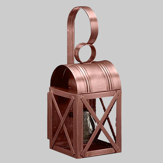 Copper lantern with a handle on a gray background