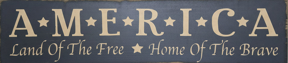 Wooden sign with 'AMERICA' text on a wooden surface