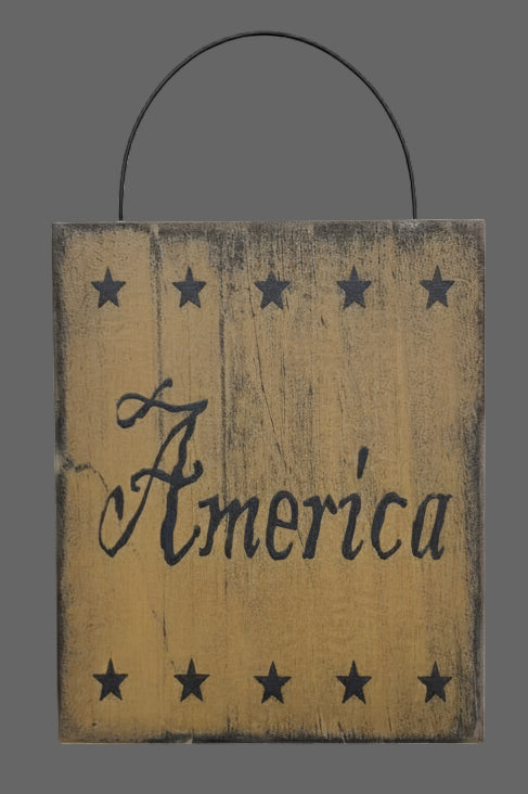 Wooden sign with 'America' text on a rustic wooden background
