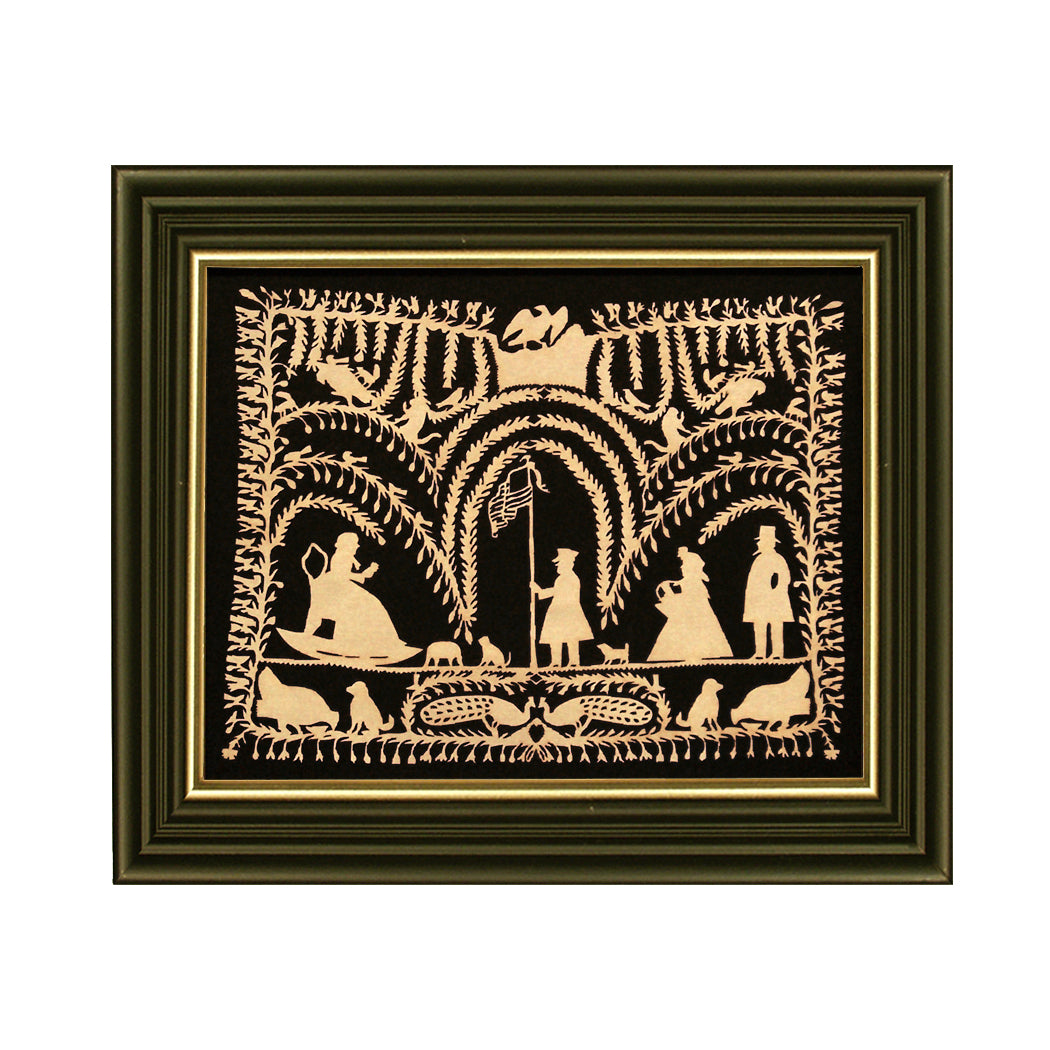 Framed paper cutting artwork featuring an early American scene with figures, animals, and a patriotic theme.