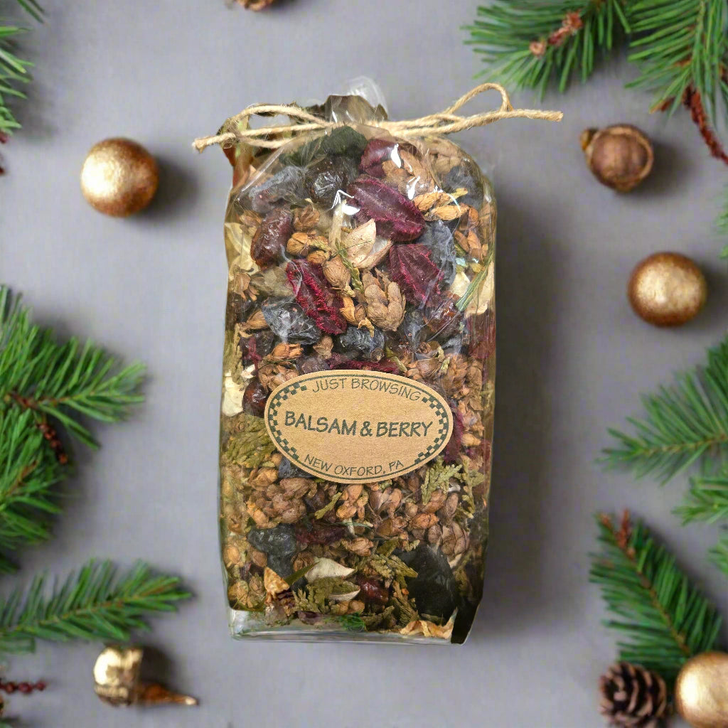 Herbal mix packaging with a label on a bed of green leaves