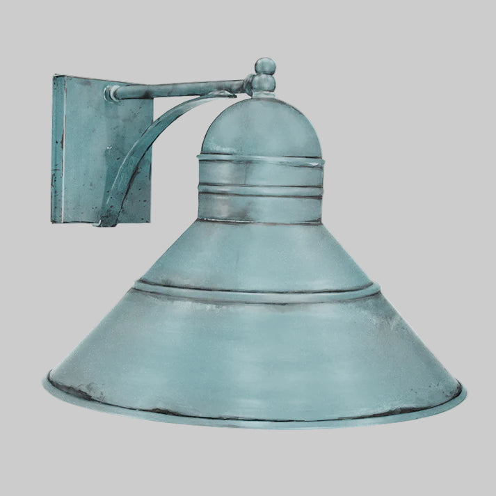 Vintage-style teal wall light fixture on a gray background