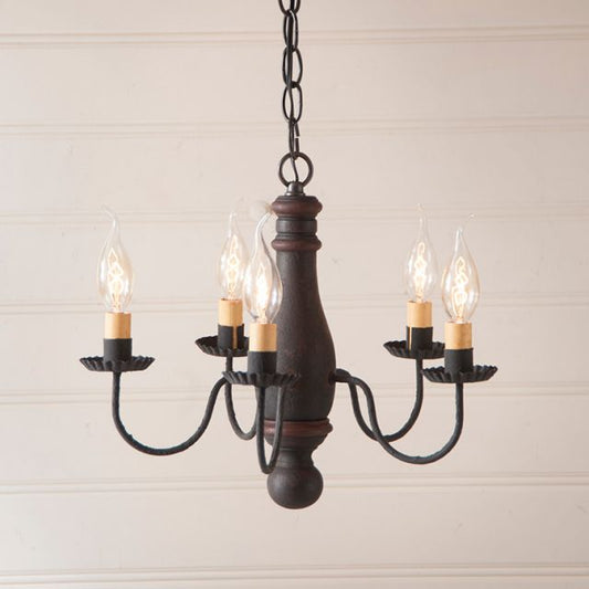 Vintage-style chandelier with five light bulbs on a neutral background