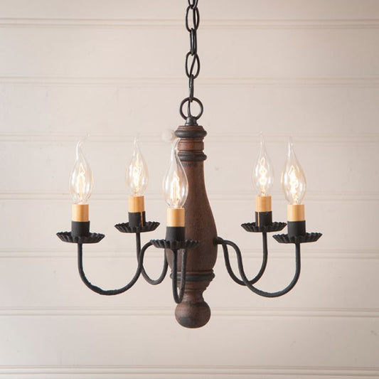 Wooden chandelier with five light bulbs on a beige background