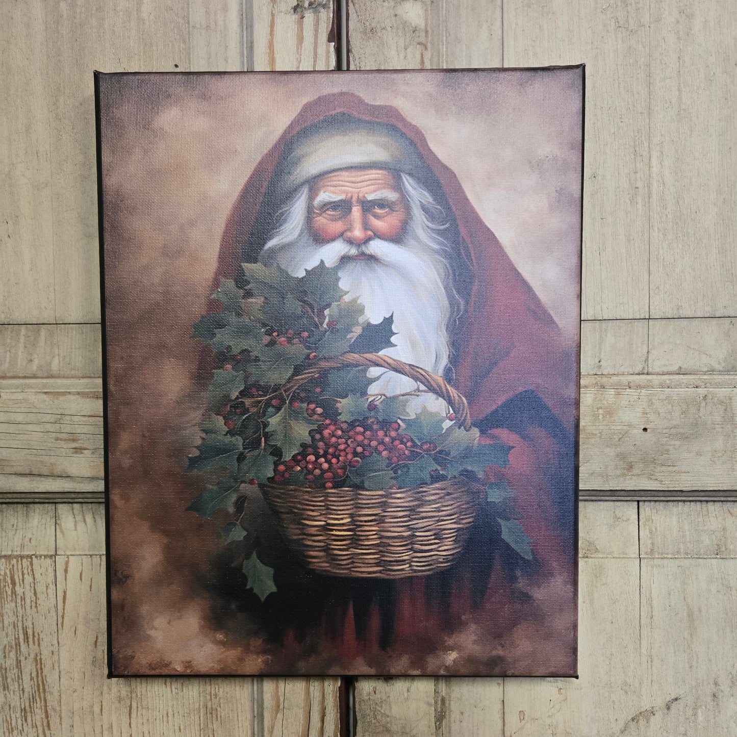 Painting of a bearded figure with a basket of fruit on a wooden surface