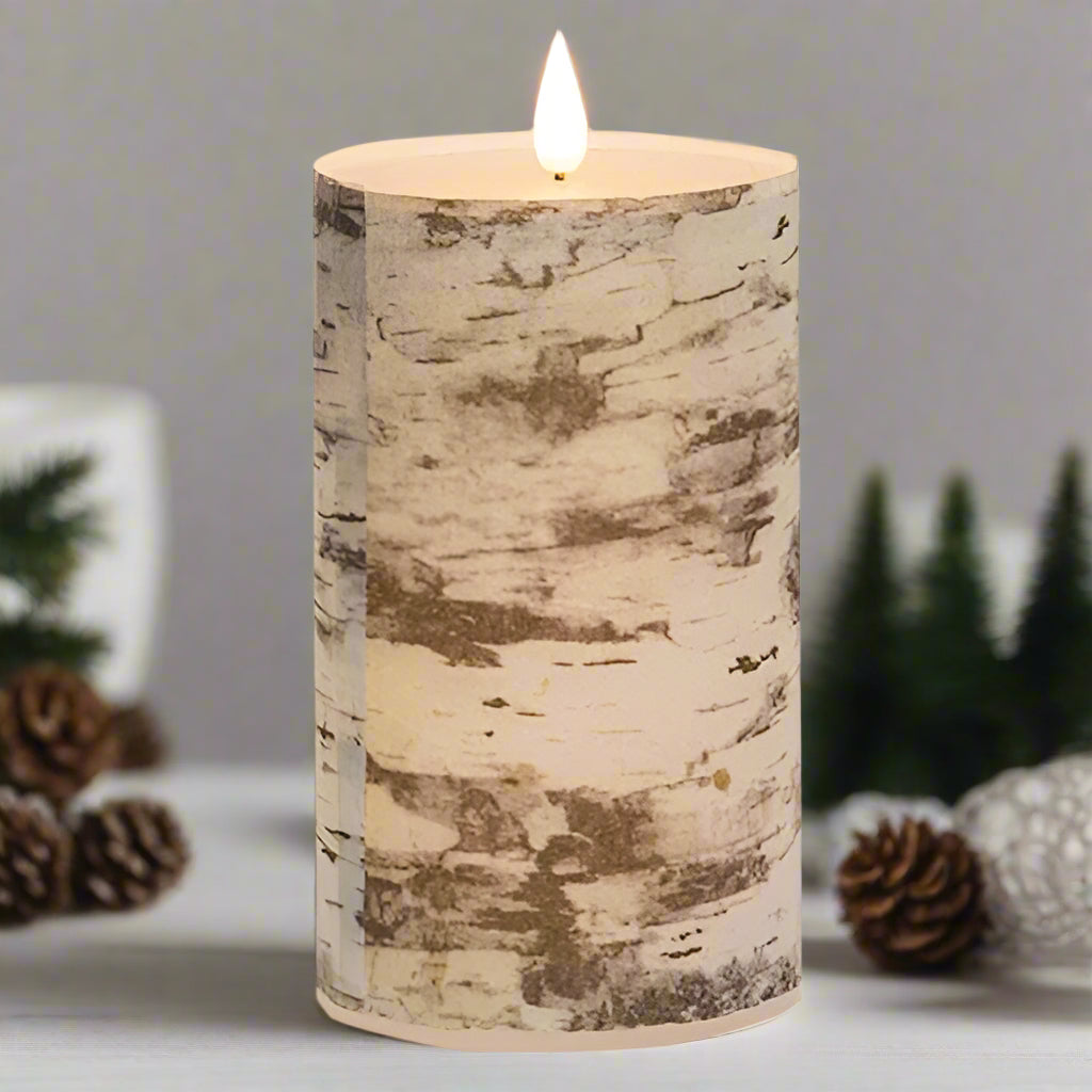 Candle with a bark-like texture with pinecones