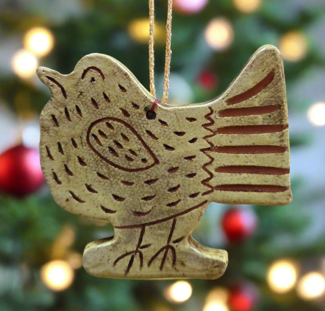 Ceramic chicken-shaped ornament with brown accents on a white background