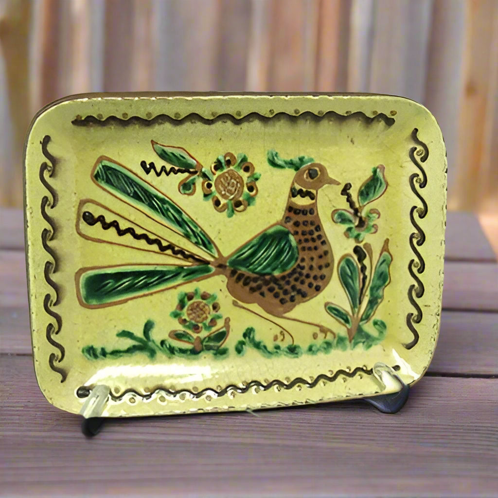 Rectangular ceramic plate with bird and squiggle border