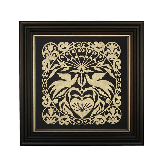 A framed paper cutting artwork featuring a geometric pattern with birds and tulips in gold on a black background, set in a black wood frame with gold edge.