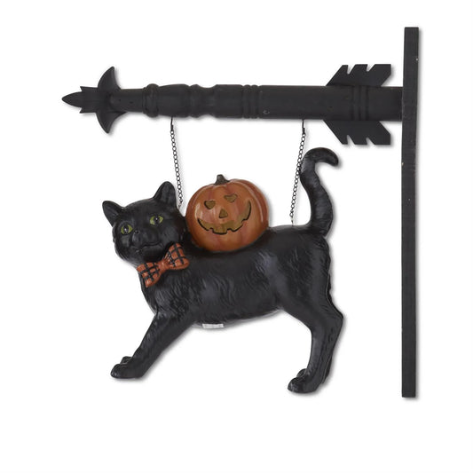 Decorative Halloween sign with a black cat and pumpkin on a white background