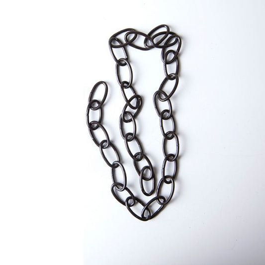 Loops of black chain on white background