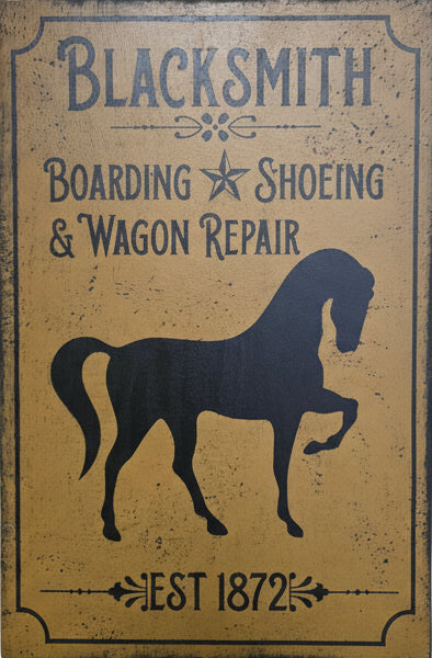 Decorative sign with black silhouette of a horse and text on a wooden background