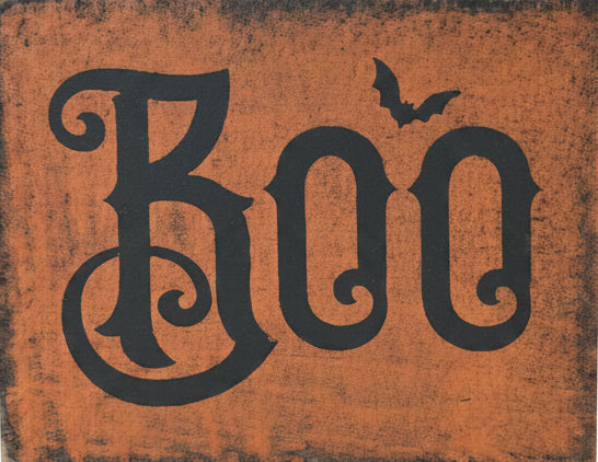 Wood block with lettering "Boo" and a bat