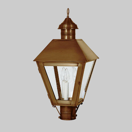 Bronze outdoor lamp with clear glass on a white background