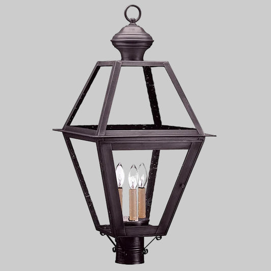 Decorative outdoor lantern with clear glass on a gray background