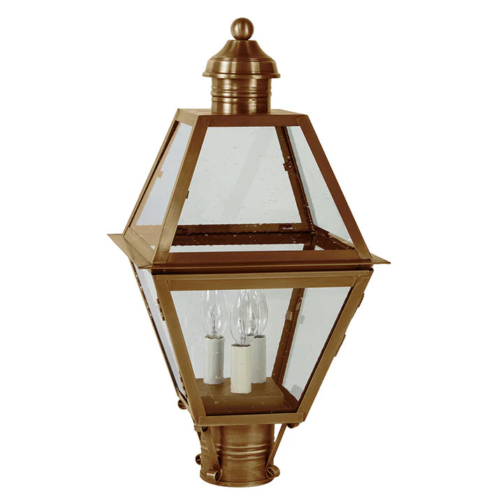 Bronze outdoor lamp with clear glass on a white background