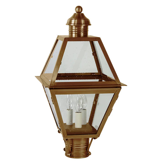 Bronze outdoor lamp with clear glass on a white background