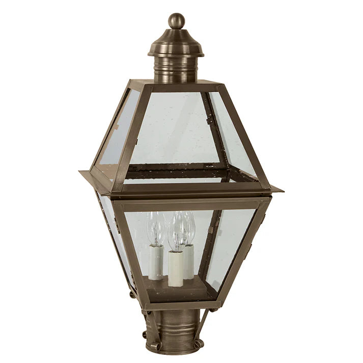 Bronze outdoor lamp with clear glass on a white background