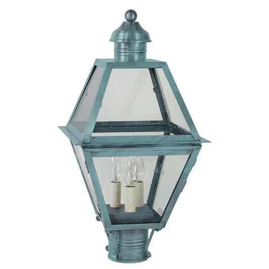 Vintage-style outdoor lamp with clear glass panels on a white background
