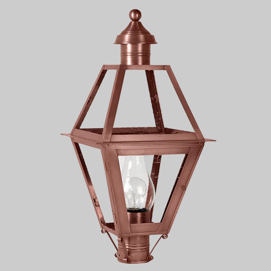 Copper outdoor lamp with clear glass on a white background