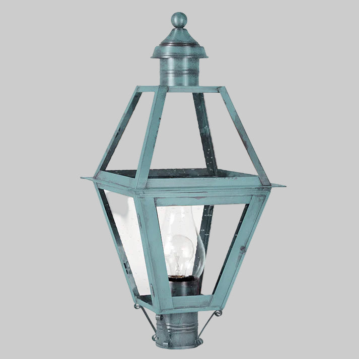 Vintage-style outdoor lamp with clear glass panels on a white background