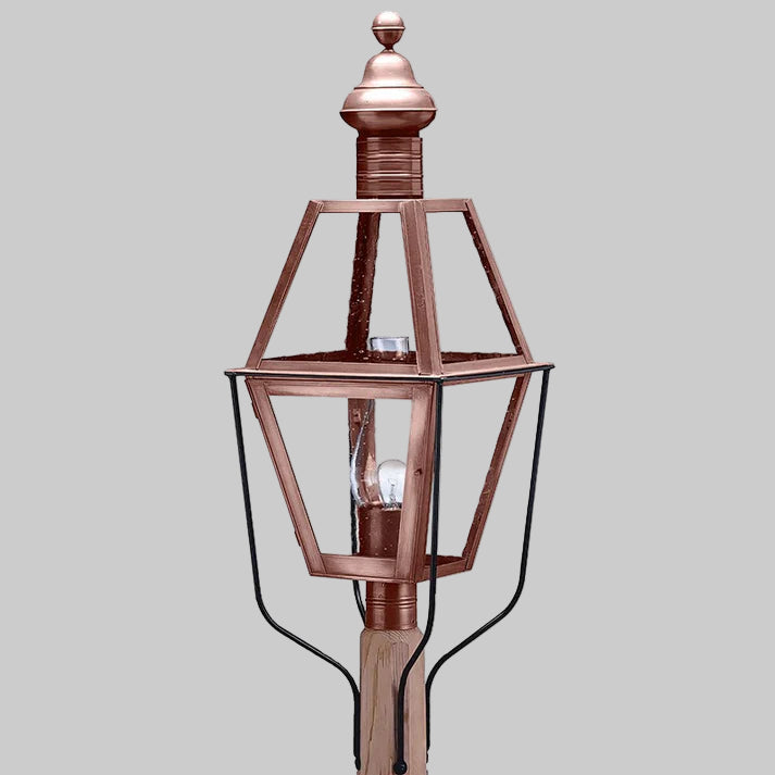 Copper outdoor lamp post on a white background