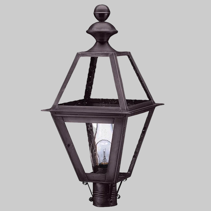 Decorative outdoor lamp with a black finish on a gray background