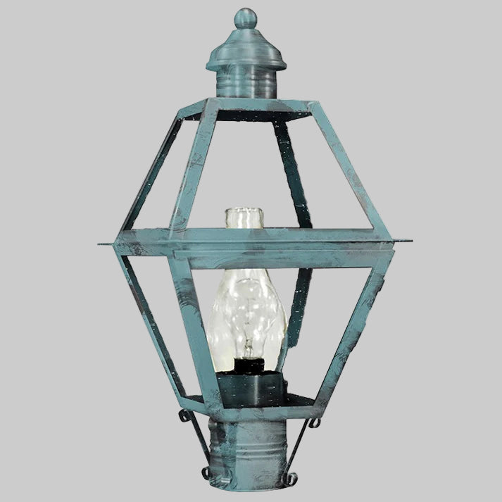 Vintage-style lantern with a clear glass shade on a gray background