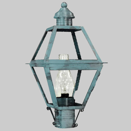 Vintage-style lantern with a clear glass shade on a gray background