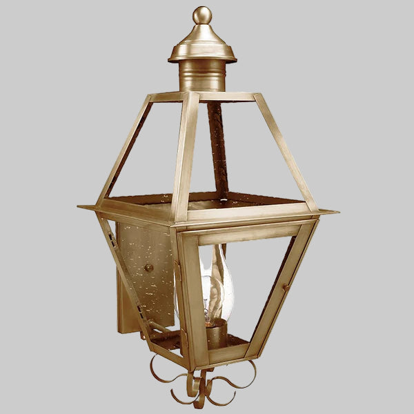 Decorative outdoor wall light fixture on a gray background