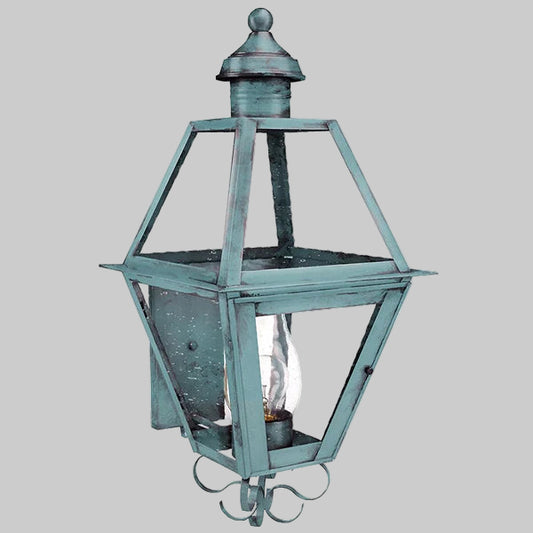 Decorative outdoor wall light fixture on a gray background