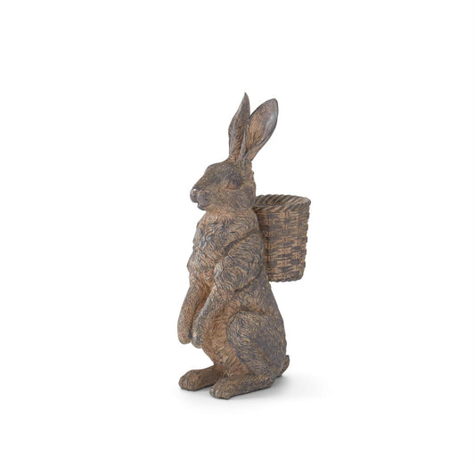 Decorative rabbit figurine with a basket on a white background
