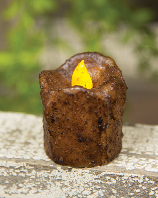 Burnt mustard mini dripped timer votive on wood surface