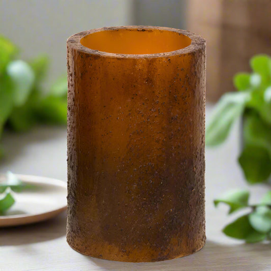 Brown textured cylindrical object on a white background