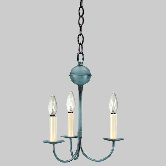 Blue chandelier with three candle-style lights on a white background