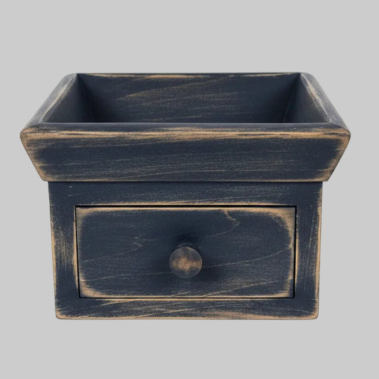 A small rustic wooden drawer box with a square top and a single front drawer, shown on a plain light gray background.
