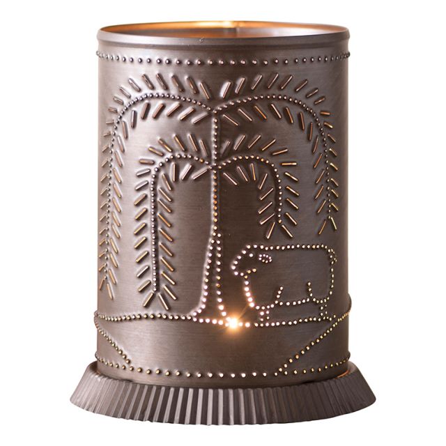Decorative metal lantern with tree and animal design on a white background