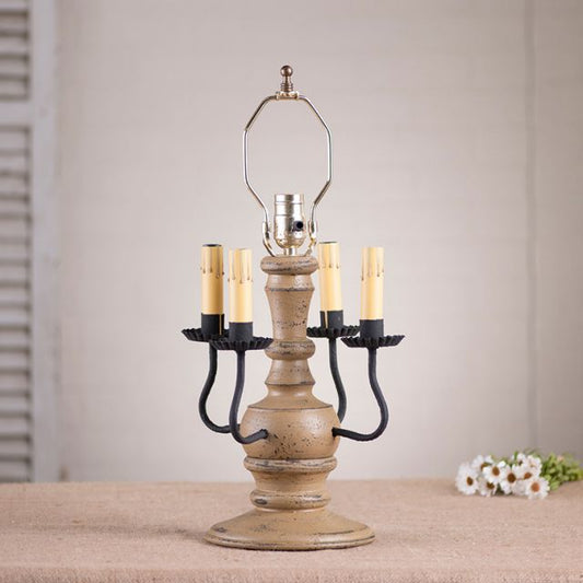 Decorative lamp with candle-like lights on a neutral background