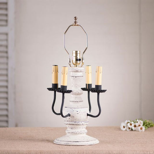 Decorative lamp with candle-like lights on a neutral background