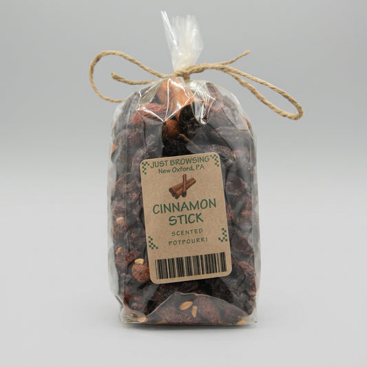 Bag of cinnamon sticks with a label on a gray background