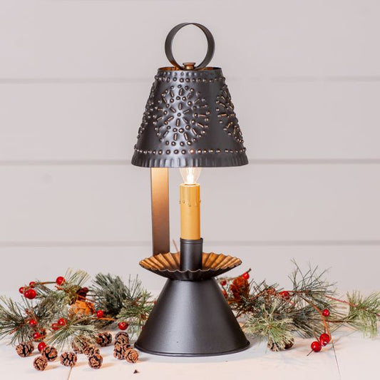 Decorative lamp with a candle-like bulb on a light gray background
