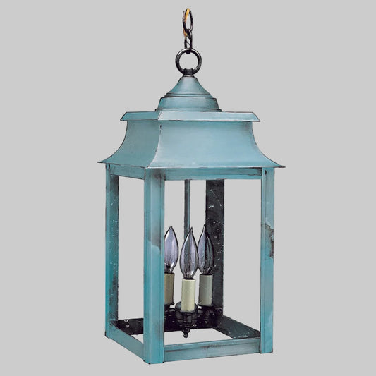 Blue lantern with candle-like lights on a white background