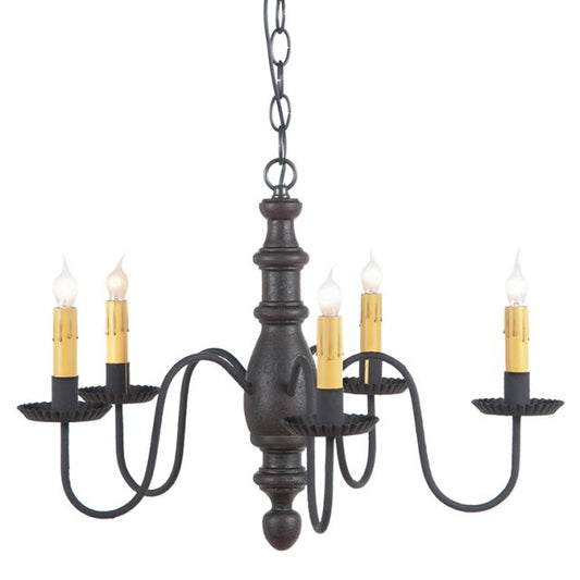 Primitive wooden five arm chandelier with 5 candelabra sockets in a black paint finish on white background.