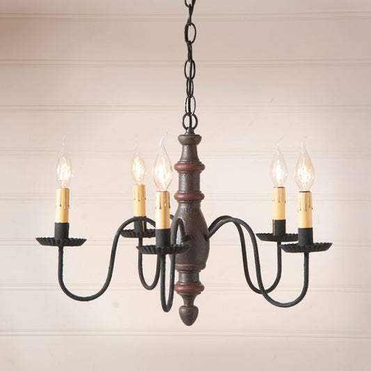 Vintage-style chandelier with five candle-like lights on a neutral background