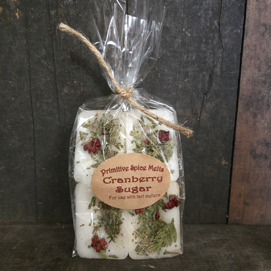 Packaged cranberry sugar with a label on a dark wooden surface