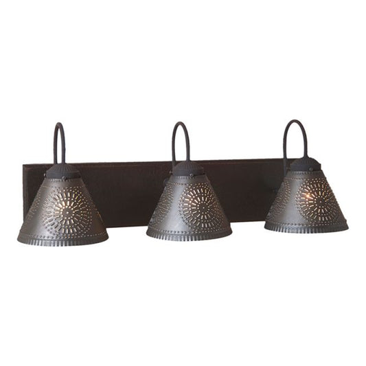 Three light vanity vanity light with tin punched shades in black on white background.